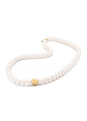 Yellow gold pearl chain rivièra