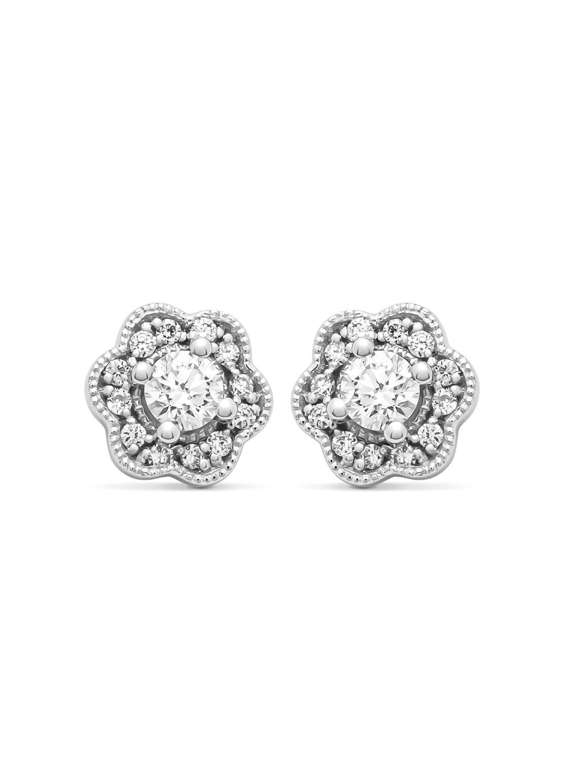 Witgouden oorsieraden, 0.28 ct diamant, Since 1904