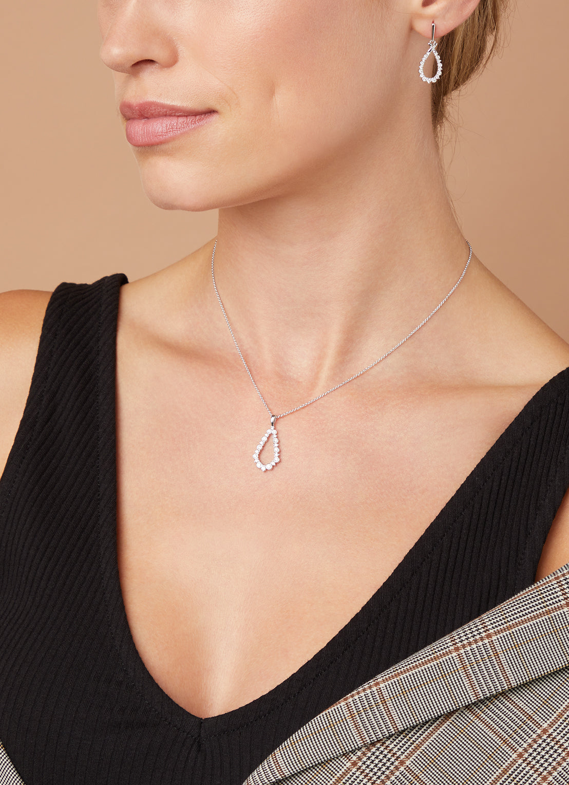 Witgouden hanger, 0.33 ct diamant, Since 1904