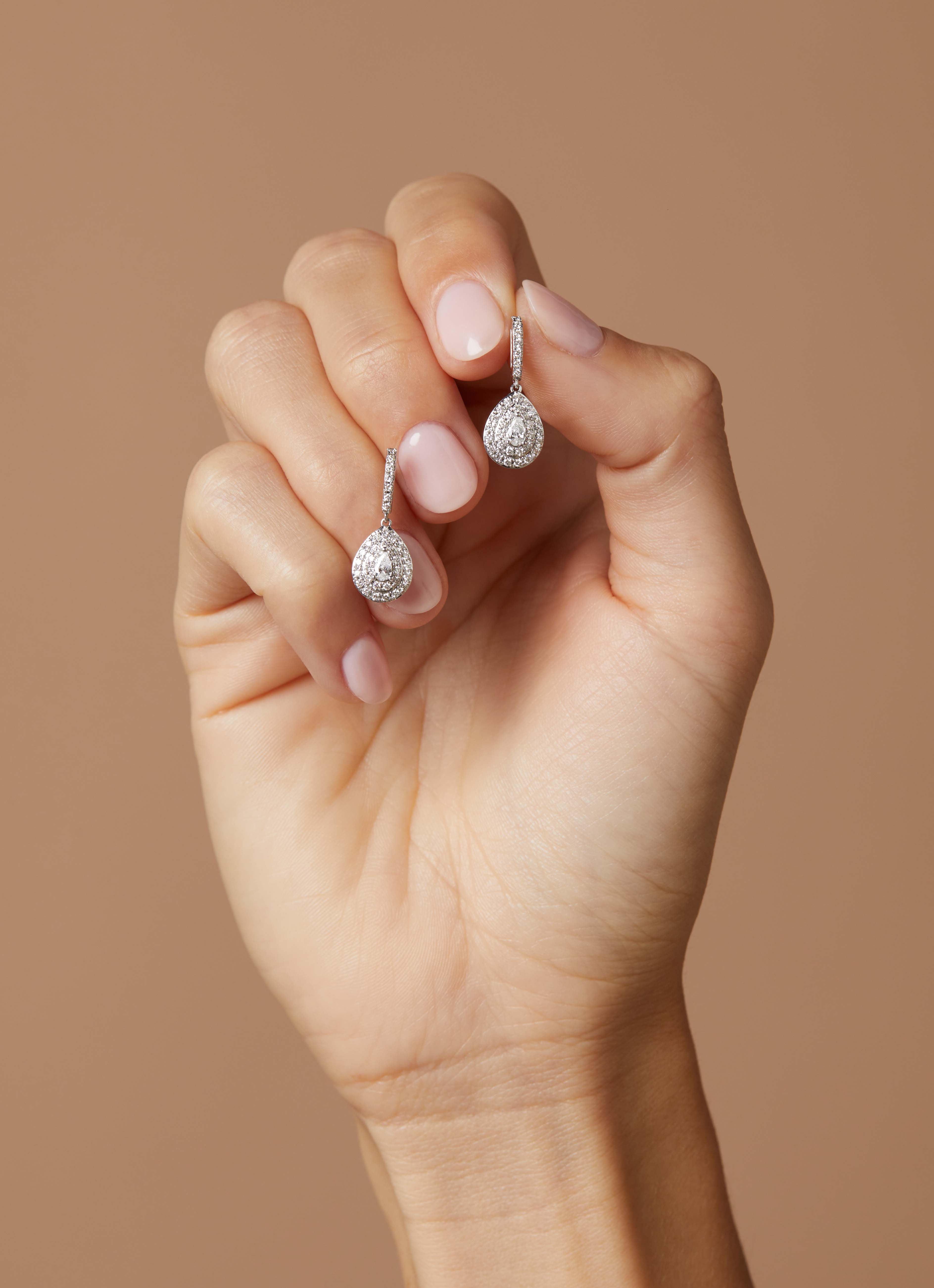 Witgouden oorsieraden, 0.58 ct diamant, Petite Romance