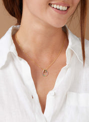 Yellow gold pendant, 0.07 ct pink sapphire, ensemble