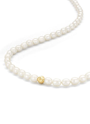 Yellow gold pearl chain rivièra