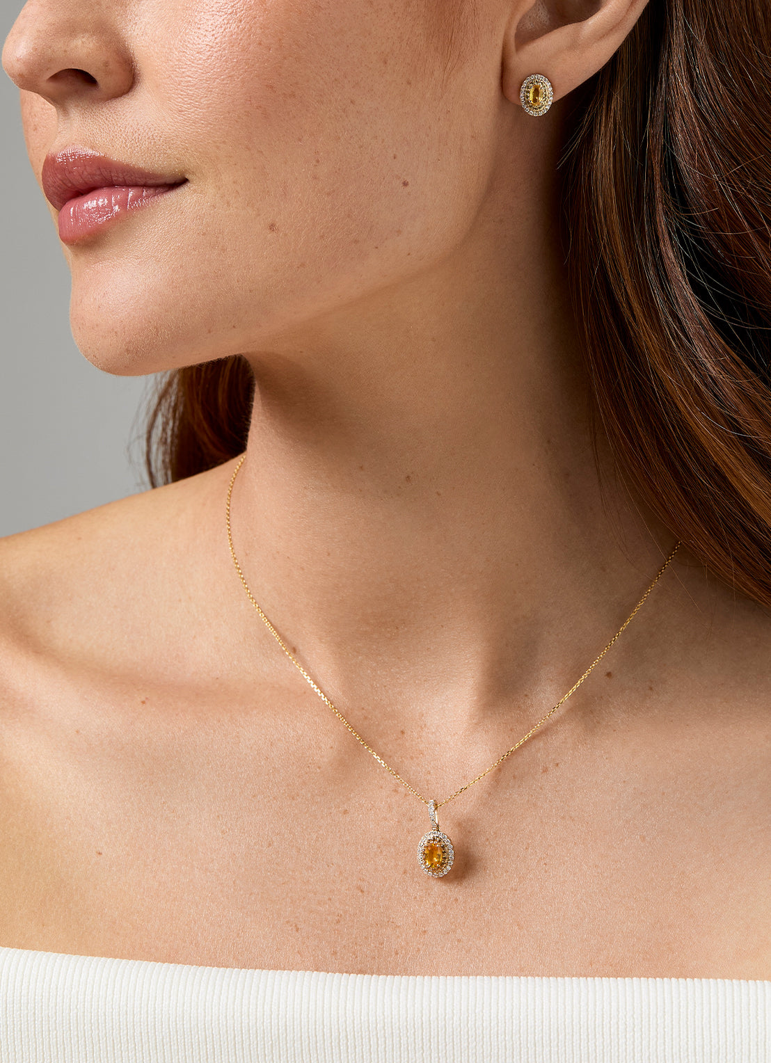 Geelgouden oorsieraden, 0.73 ct gele saffier, Eden