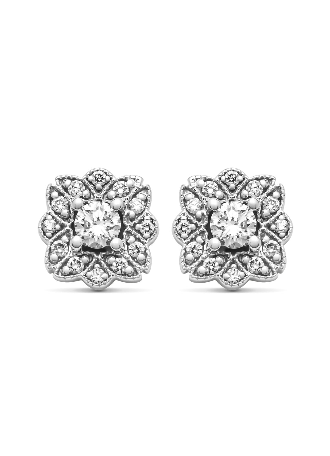 White gold ear jewelry, 0.29 ct diamond, Since 1904
